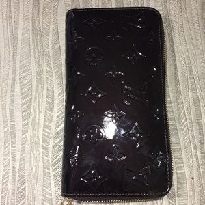 Louis Vuitton Authentic Zippy Wallet in Amarante